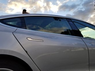 18-khqinmqtesla-model-3-silver.jpg
